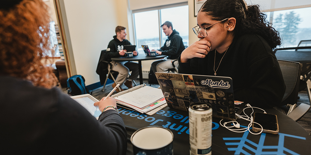Students studying in the Academic Center for Excellence