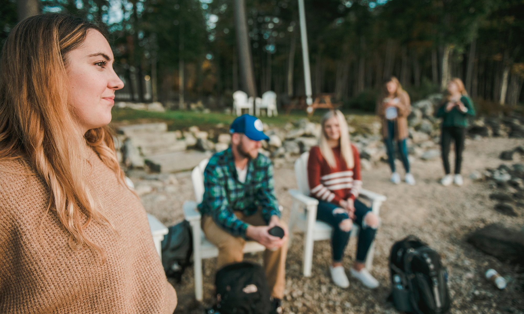 Saint Joseph's College of Maine students hang out down at the campus lakefront.