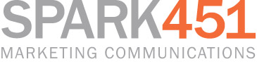 Logo of Spark451, featuring the text "SPARK451" in large letters, with "SPARK" in grey and "451" in orange, above the smaller text "MARKETING COMMUNICATIONS" in grey, symbolizing a strong foundation of support in marketing excellence. Saint Joseph's College of Maine