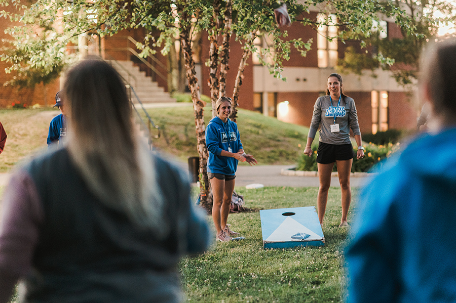 students playing lawn games