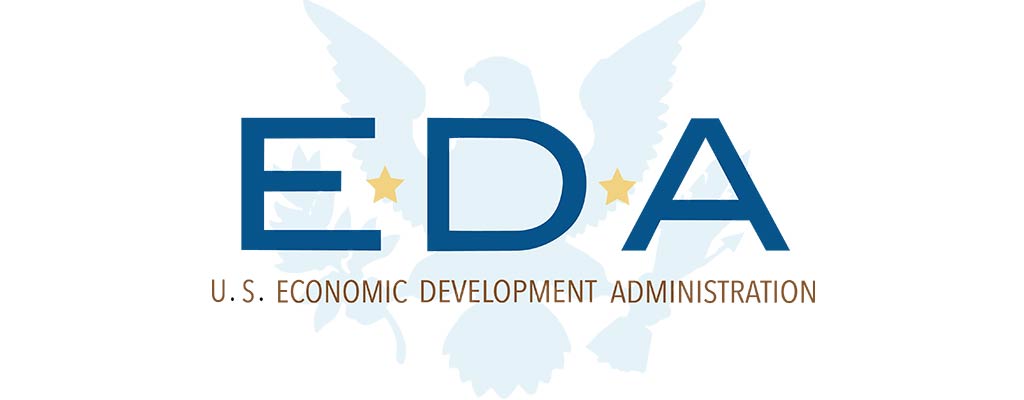 Logo of the U.S. Economic Development Administration (EDA) featuring blue letters "EDA" with gold stars and a white eagle silhouette in the background. Text below reads "U.S. Economic Development Administration - In Partnership with the Institute for Local Food Systems Innovation. Saint Joseph's College of Maine